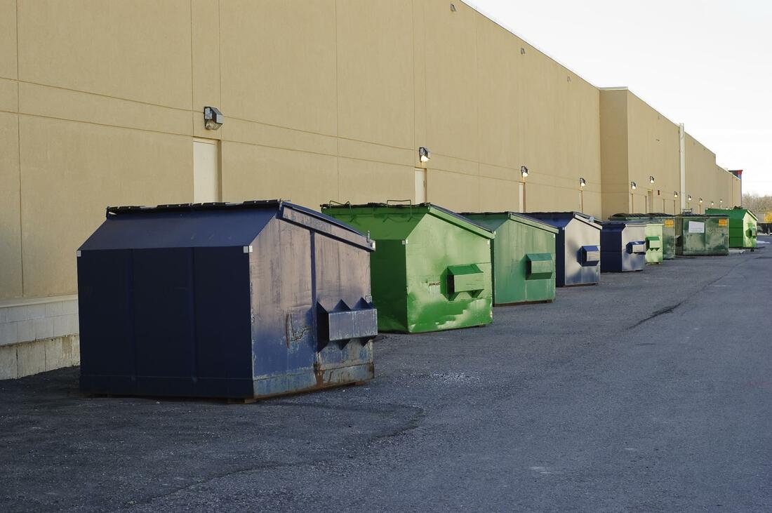 A line of dumpsters for rent